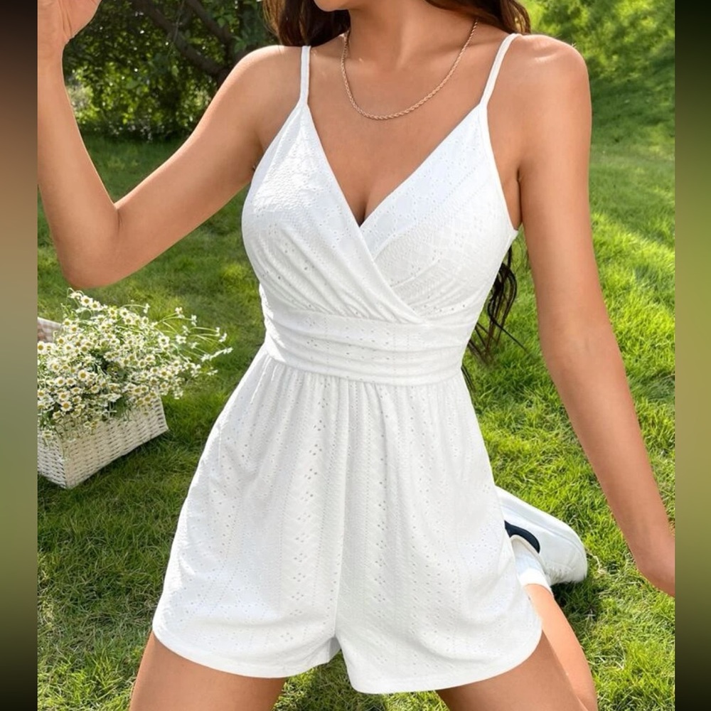 White stretchy eyelet style zip up romper!!